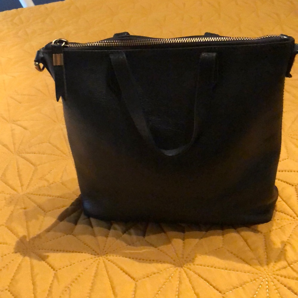 Madewell medium transport leather bag.